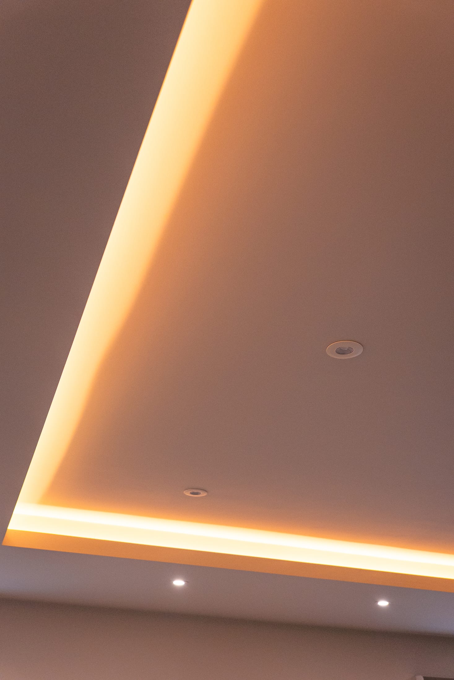 Layered LED lighting set to a scene in a living space
