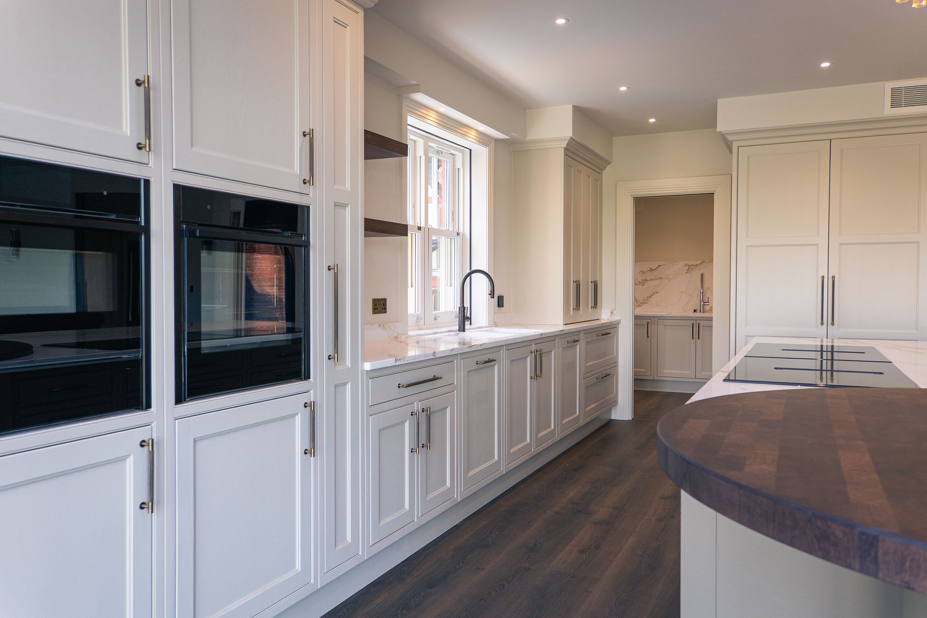A Loxone controlled home interior with layered evening lighting