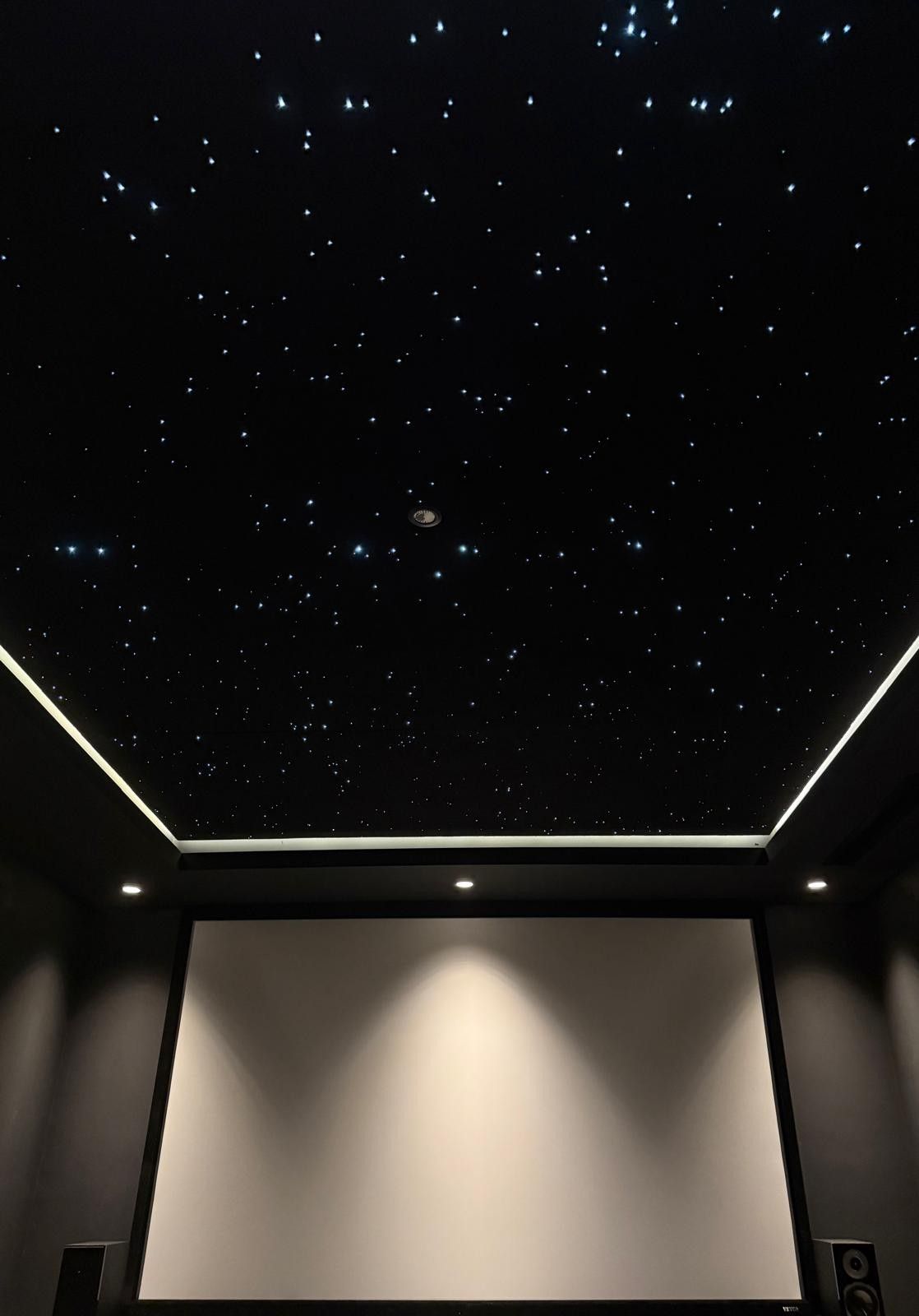 A custom starlit ceiling in a cinema room