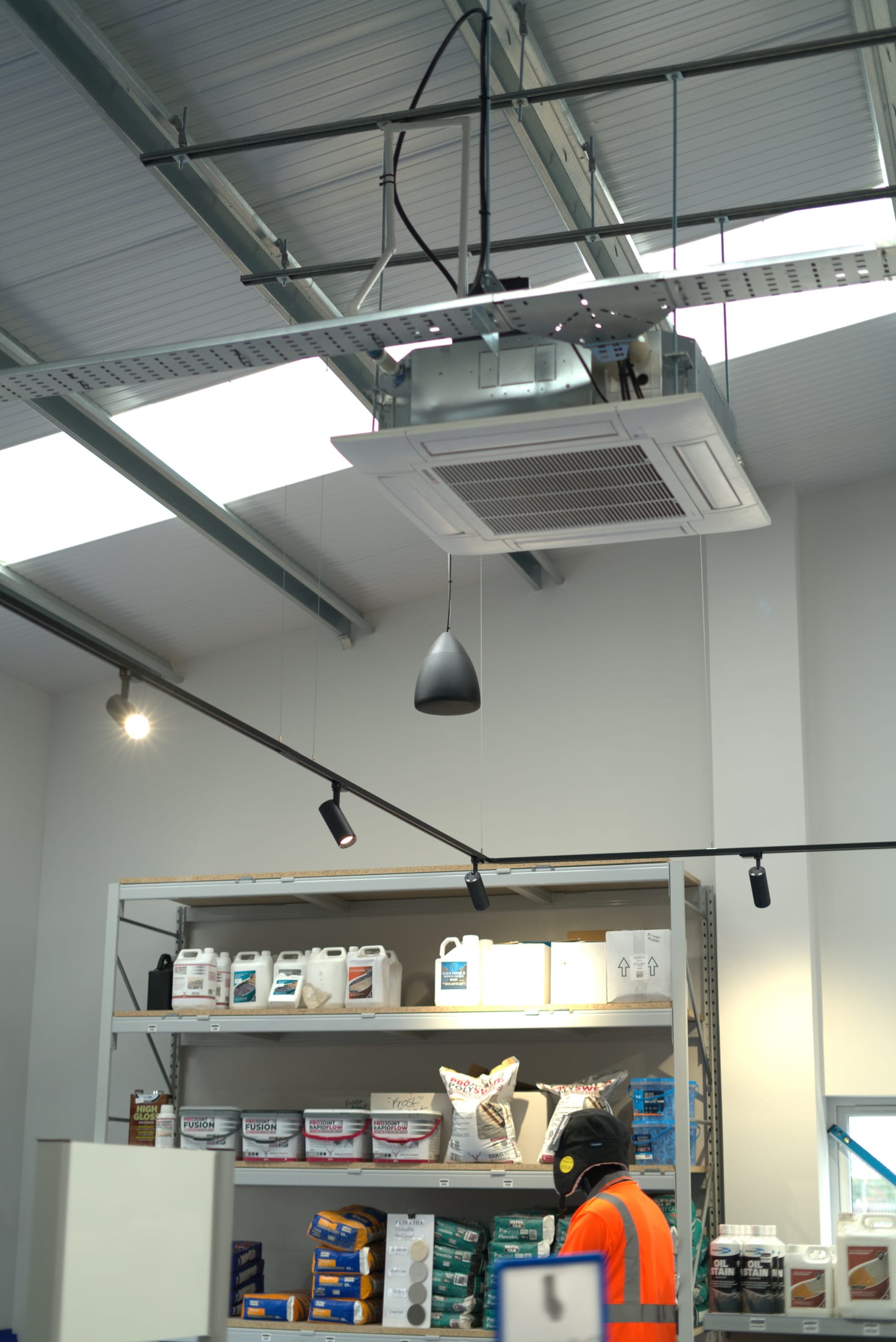 Shop floor with designed track lighting